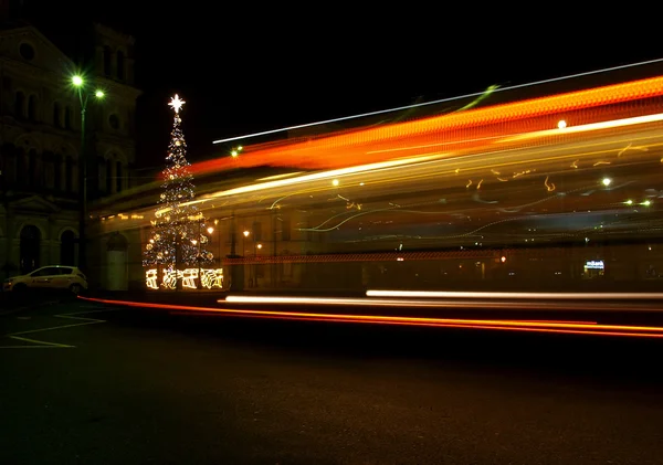 Bus  and Christmas tree.