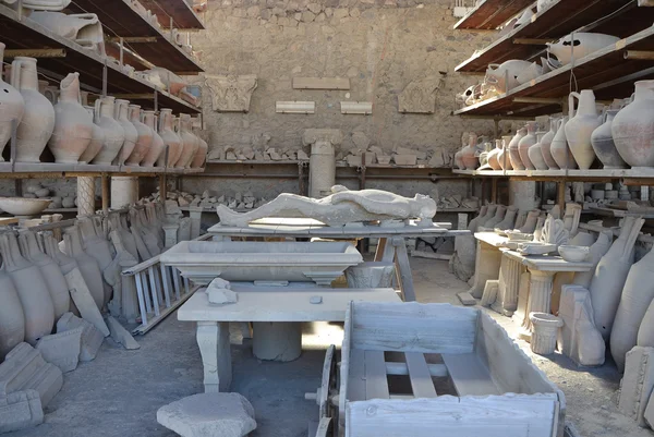 Collection of objects found during excavations in ancient Pompeii