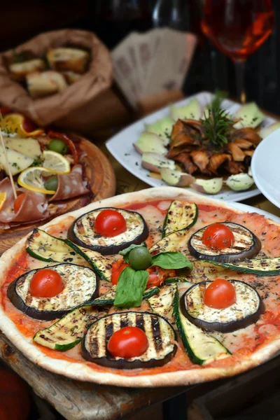 Pizza and food arrangement