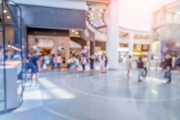 Blurred image of people in shopping mall