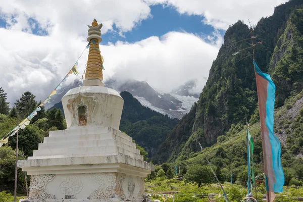 YUBENG, CHINA - Aug 8 2014: Pagoda at Yubeng Village. a famous landmark in the Tibetan village of Deqin, Yunnan, China.