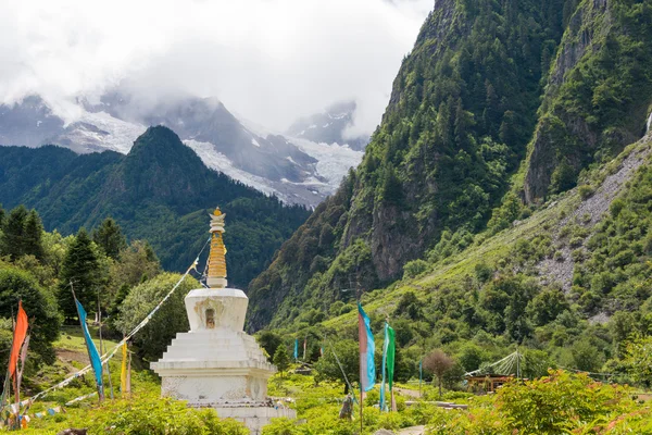 YUBENG, CHINA - Aug 8 2014: Pagoda at Yubeng Village. a famous landmark in the Tibetan village of Deqin, Yunnan, China.