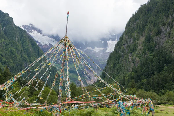 YUBENG, CHINA - Aug 9 2014: Prayer flag at Yubeng Village. a famous landmark in the Tibetan village of Deqin, Yunnan, China.