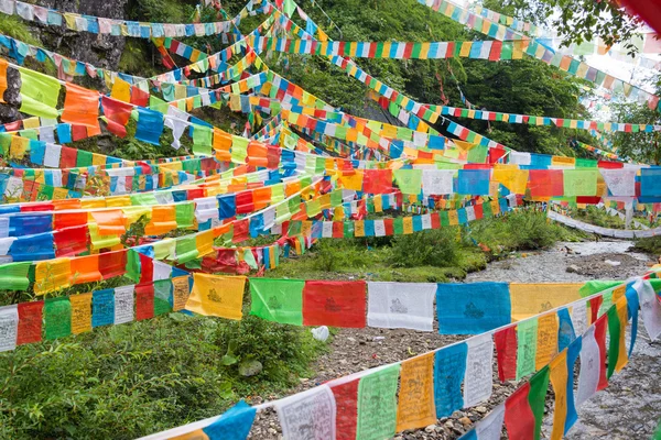 YUBENG, CHINA - Aug 10 2014: Prayer flag at Yubeng Village. a famous landmark in the Tibetan village of Deqin, Yunnan, China.