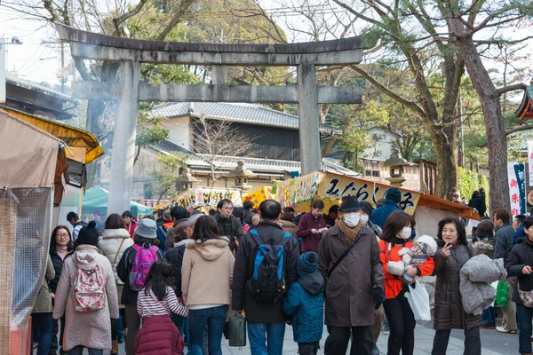 KYOTO, JAPAN - Jan 11 2015: Approach to Fushimi Inari-taisha Shrine. a famous shrine in the Ancient city of Kyoto, Japan.