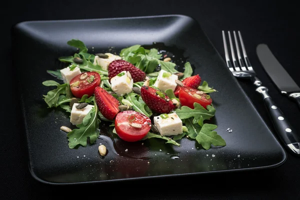 Strawberry tomato salad, feta cheese, olive oil