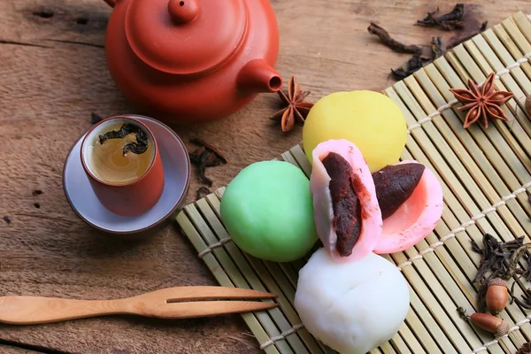 Mochi japanese dessert red bean colorful and hot tea