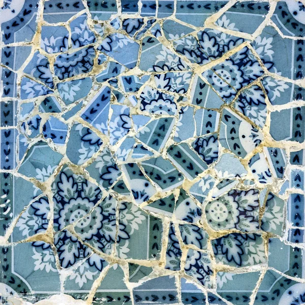 Broken glass mosaic tile, decoration in Park Guell, Barcelona