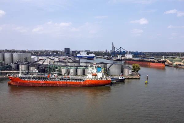 ROTTERDAM, NETHERLANDS - JULY 5, 2016: Cargo vessel in sea port Rotterdam, Netherlands.
