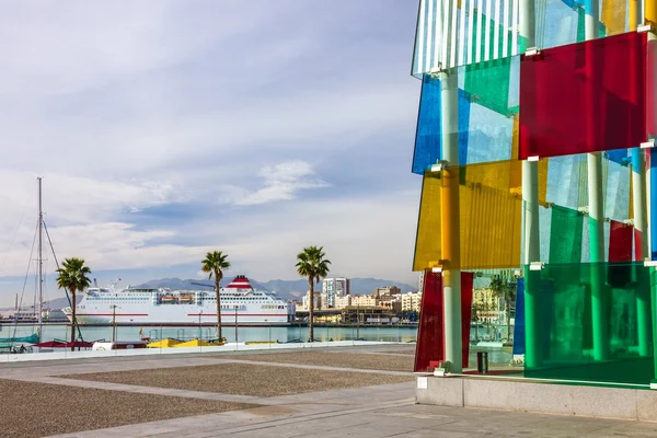 MALAGA, PORTUGAL - JULY 21, 2016: Malaga seafront glass cube modern building, Spain