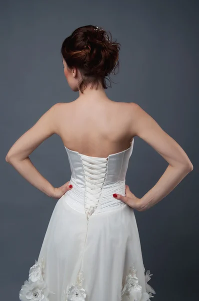 Bridal fashion. View from the back. Strapless dress.