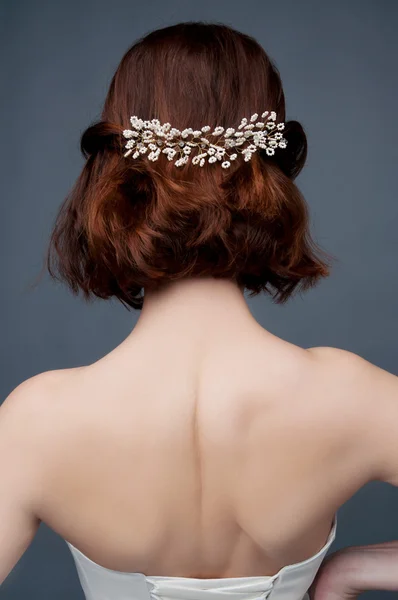 Bridal fashion. View from the back. Strapless dress.