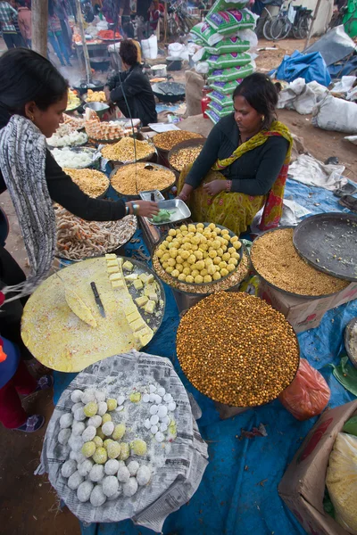 Street seller cooking in nepali fair