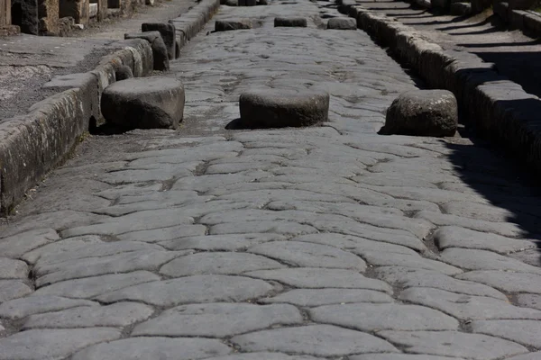 Main roads of Pompeii with raised stones to facilitate cleaning