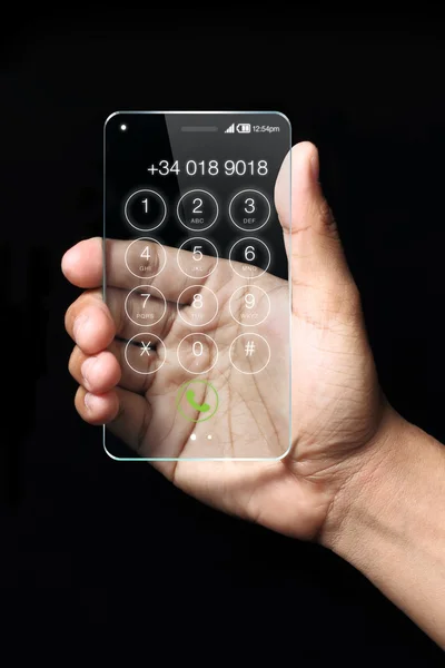 Transparent smartphone with hand on dark background.