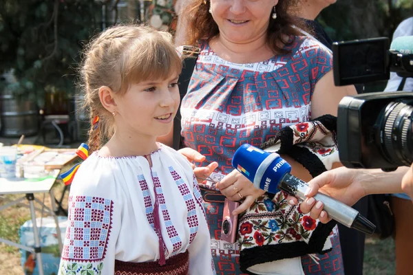 The girl in national clothes of Moldova