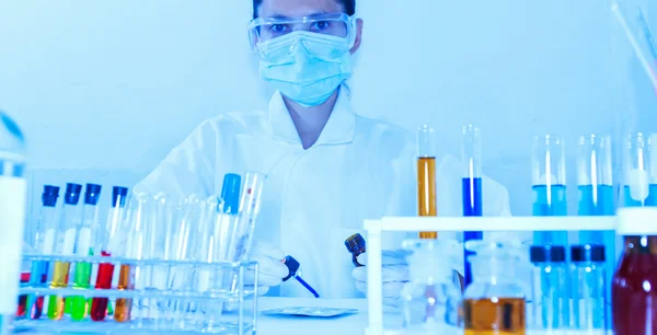 Scientist with equipment laboratory for science concept and sele