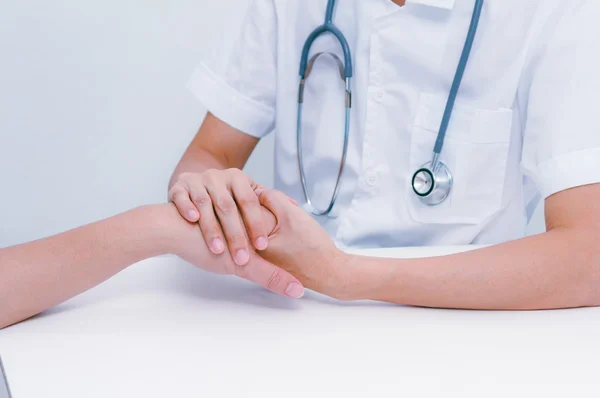 Doctor holding patient\'s hand, helping hand concept,medical doct