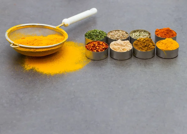 Mix spices and herb background.