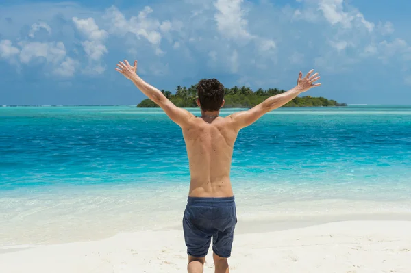 Man running on beach