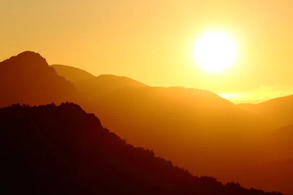 Back light of a sunset on a mountain