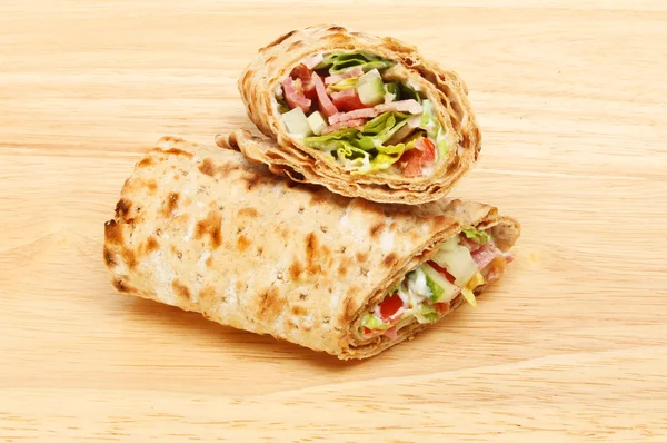 Sandwich wraps on a board