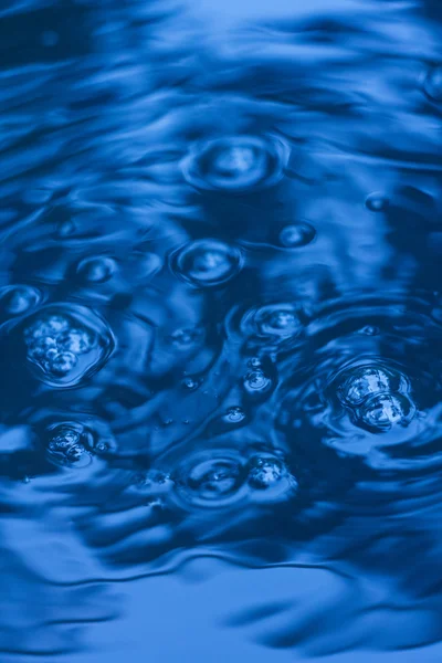 Bubbles on the surface of pure water