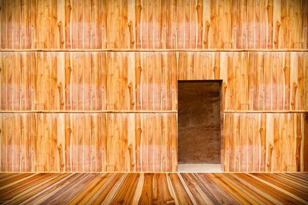 Wooden wall with door and wood floor in front off