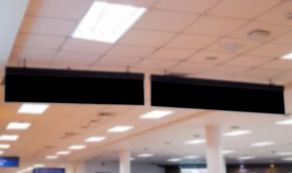 Empty office sign hanging on ceiling