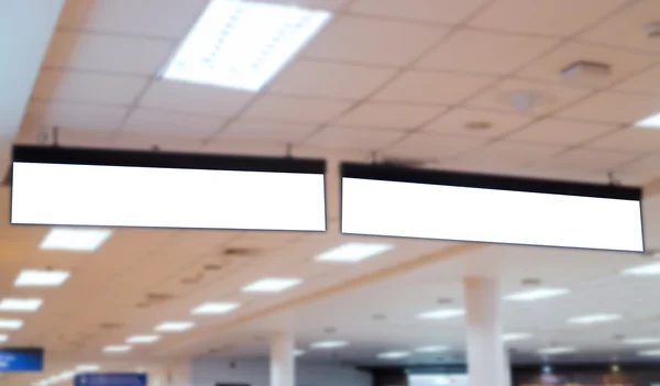 Empty office sign hanging on ceiling