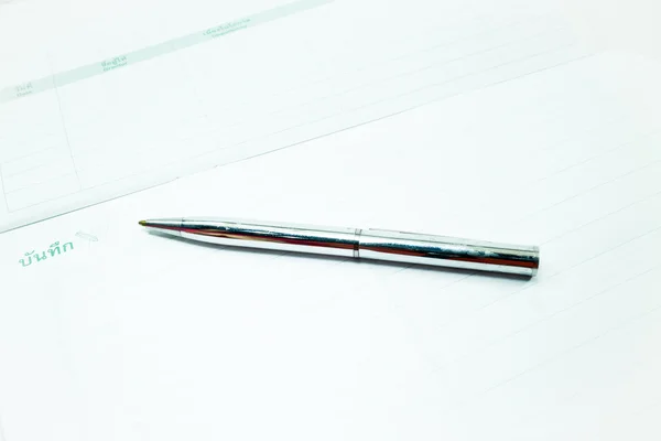 Metallic pen and recording paper