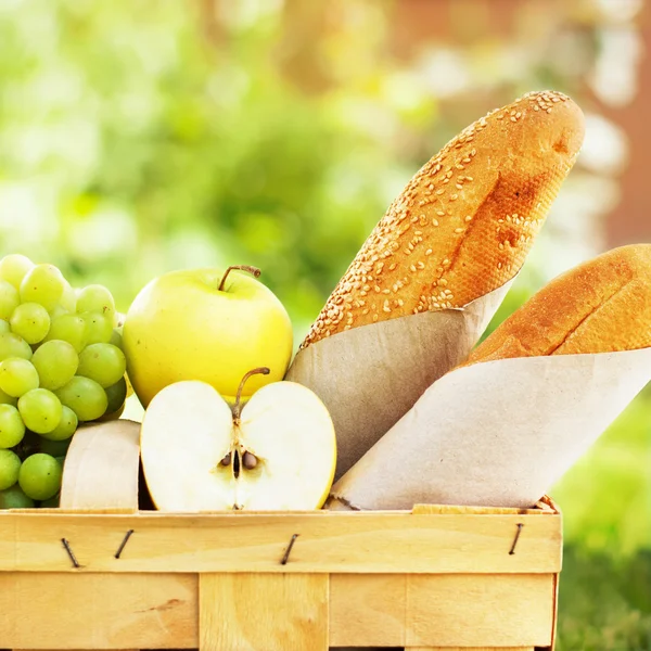 Picnic Basket with Fresh Food, Bread, Apples, Fruit