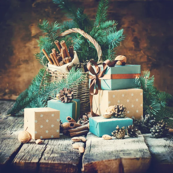 Christmas Card. Gifts with Boxes, Basket, Pine Cones, Walnutsd. Toned