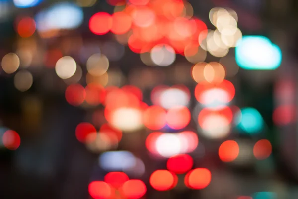 Traffic in Night City. Blurred Defocused Multi Color Lights