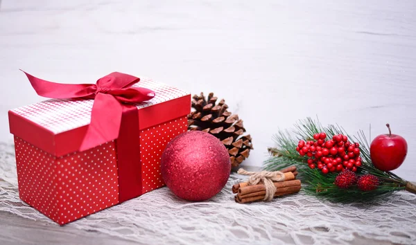 Christmas Presents and Ornaments on Wooden Background