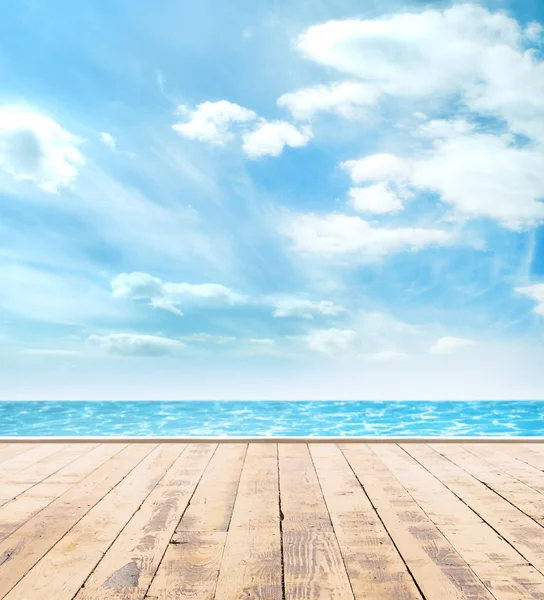 Wooden pier, exotic sea and the blue sky