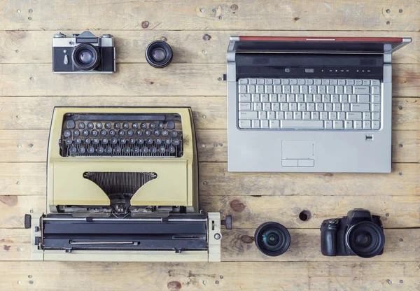 Journalistic equipment on a wooden table