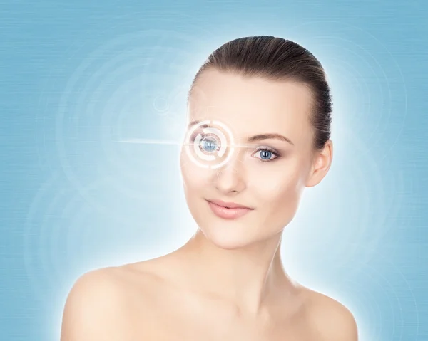 Woman with hologram on eye