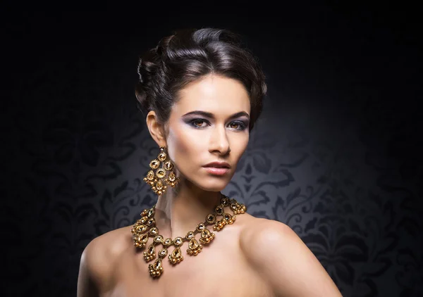 Beautiful and rich woman in jewels