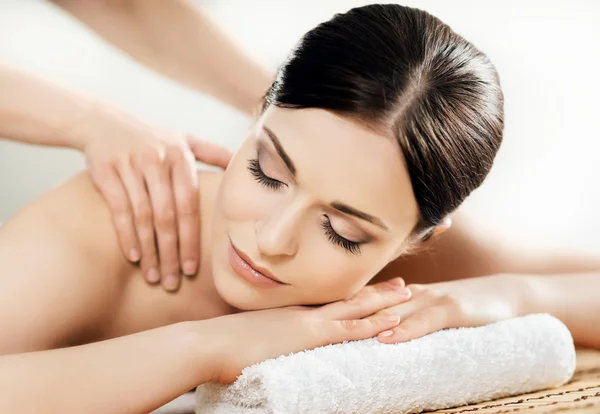 Woman in spa massage procedure