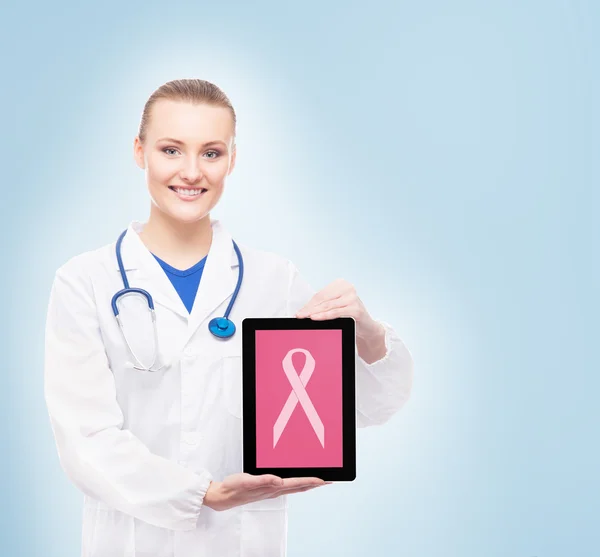 Doctor with tablet and pink ribbon