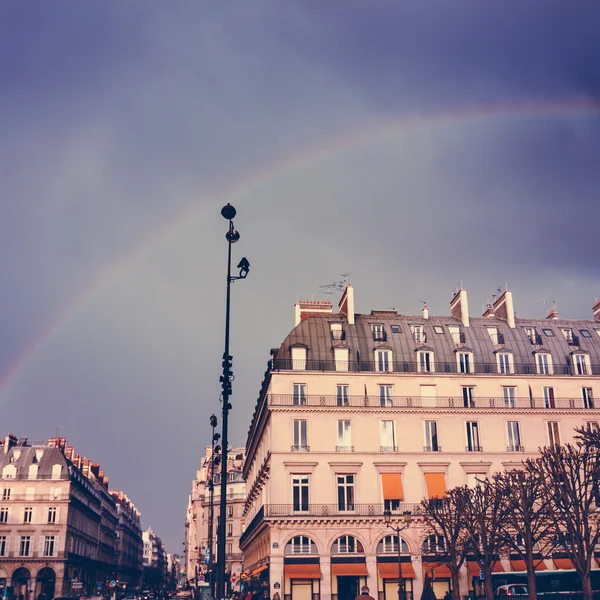 Paris Street View with Rainbow in the Sky After Rain