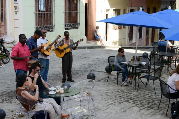 Traditional music band playing for tourists in a restaurant