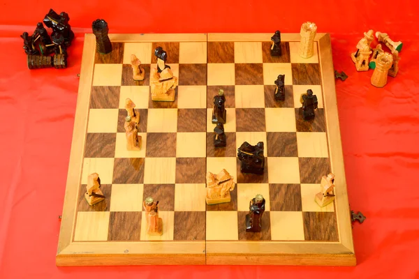 Chess board on red background