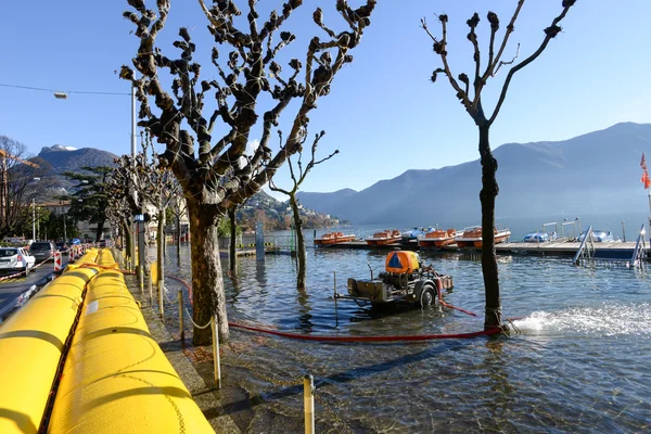 People of civil Protection pumping water