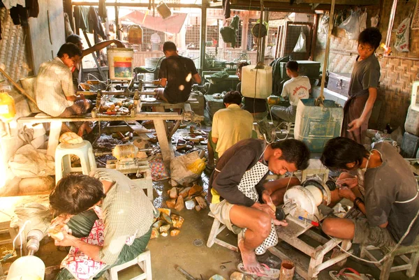 People processing of semi-precious stones on a factory of Mandal