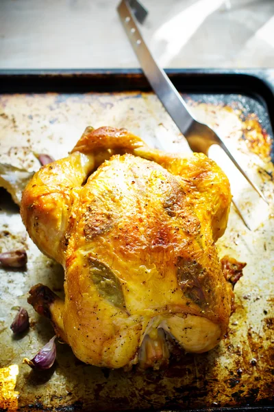 The chicken baked entirely on a baking sheet