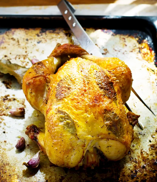 The chicken baked entirely on a baking sheet