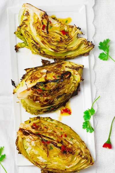 The cabbage baked on a grill