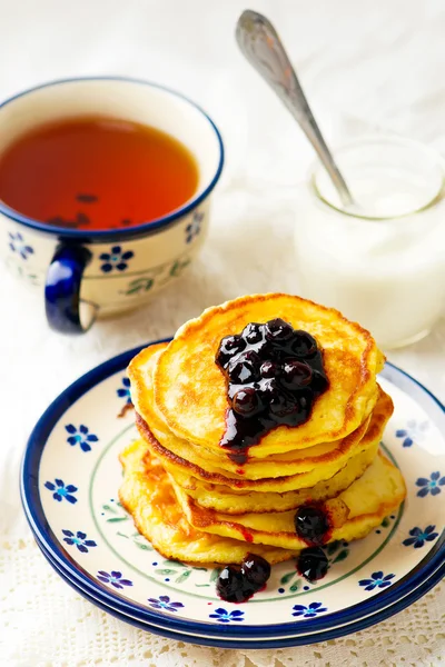 Pumpkin pancakes with berry sauce